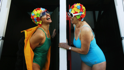 Ladies laughing in swimsuits