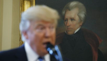 U.S. President Donald Trump speaks in front of a portrait of former U.S. President Andrew Jackson during a swearing-in ceremony for new Attorney General Jeff Sessions at the White House in Washington, U.S., February 9, 2017.