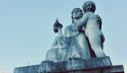 Spirit of Justice statue at US Capitol, showing mother and child.