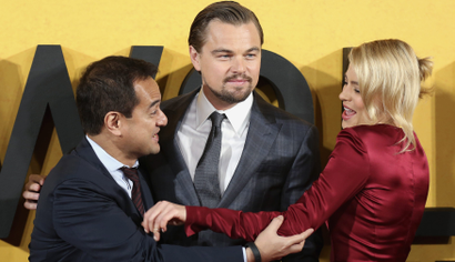 Producer Riza Aziz and cast members Leonardo DiCaprio and Margot Robbie arrive for U.K. Premiere of The Wolf of Wall Street in London