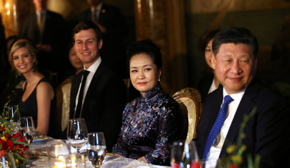 China's first lady Peng Liyuan looks at Chinese President Xi Jinping (R) as she sits next to Trump Senior Advisor Jared Kushner and Ivanka Trump (L), during a dinner at the start of a summit between U.S. President Donald Trump and Chinese President Xi at Trump's Mar-a-Lago estate in West Palm Beach, Florida, U.S. April 6, 2017. REUTERS/Carlos Barria - RTX34GUG