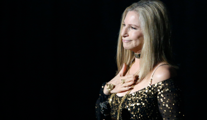 Barbra Streisand accepts the applause after performing the song "Memories" from the film "The Way We Were" at the 85th Academy Awards in Hollywood, California February 24, 2013. REUTERS/Mario Anzuoni (UNITED STATES TAGS:ENTERTAINMENT) (OSCARS-SHOW) - RTR3E946