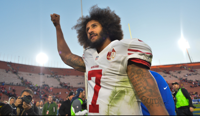 Dec 24, 2016; Los Angeles, CA, USA; San Francisco 49ers quarterback Colin Kaepernick (7) pumps his fist as he acknowledges the cheers from the 49ers' fans after leading his team to a 22-21 come-from-behind win over the Los Angeles Rams at Los Angeles Memorial Coliseum. Mandatory Credit: Robert Hanashiro-USA TODAY Sports - 9767585