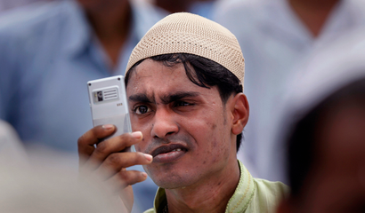 Indian man on phone