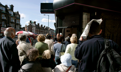 Customers line up outside Northern Rock in 2007, the first run on a British bank in 150 years.