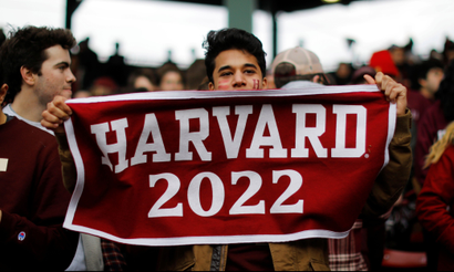 A Harvard University student cheers during the 135th playing of "The Game" against Yale University, at Fenway Park in Boston, Massachusetts, U.S., November 17, 2018. REUTERS/Brian Snyder - RC140C5D1500