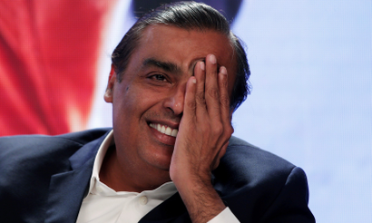 Mukesh Ambani, chairman and managing firector of Reliance Industries, gestures as he answers a question during a media interaction in New Delhi, India, June 15, 2017.