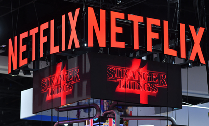 The Netflix booth advertises Stranger Things Season 4 on a screen during Comic-Con International in San Diego, California, on July 24, 2022. 