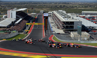 Sebastian Vettel, of Germany, leads the field into the first turn for the start of the F1 U.S. Grand Prix auto race at the Circuit of the Americas, in Austin, Texas in 2012.