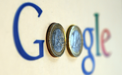 A google logo with two Euro coins for the 'o's.