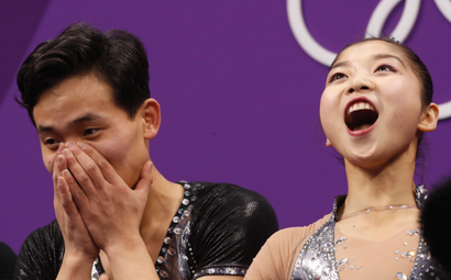 Ryom Tae Ok and Kim Ju Sik of North Korea react after their scores are posted following their performance in the pair figure skating short program in the Gangneung Ice Arena at the 2018 Winter Olympics in Gangneung, South Korea, Wednesday, Feb. 14, 2018. (AP Photo/Bernat Armangue)