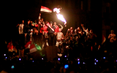 egyptian protestors capturing the revolution with cell phone cameras