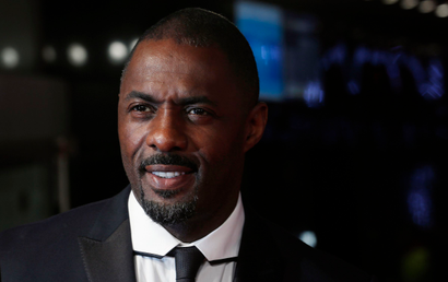 Cast member Idris Elba, who portrays Nelson Mandela in the film, arrives for the Royal Premiere of "Mandela: Long Walk to Freedom" in London December 5, 2013. South African anti-apartheid hero Mandela died aged 95 at his Johannesburg home on Thursday after a prolonged lung infection, plunging his nation and the world into mourning for a man hailed by global leaders as a moral giant. REUTERS/Suzanne Plunkett (BRITAIN - Tags: ENTERTAINMENT POLITICS OBITUARY) - RTX165P4