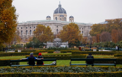 People sit in a public garden amidst the coronavirus disease (COVID-19) outbreak, as Austria's government imposes a lockdown on people who are not fully vaccinated, in Vienna, Austria
