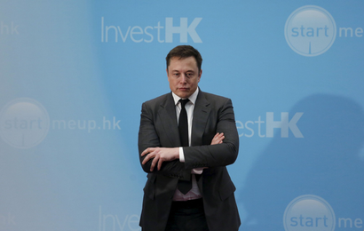 Tesla Chief Executive Elon Musk stands on the podium as he attends a forum on startups in Hong Kong, China January 26, 2016. REUTERS/Bobby Yip/File Photo - RTX2J8MS