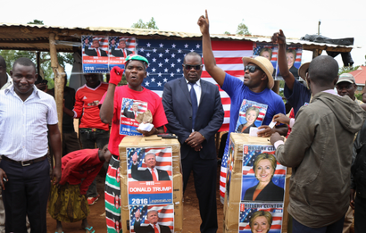 Comedians stage a mock election in the village of Kogelo, the home town of Sarah Obama, step-grandmother of President Barack Obama, in western Kenya, Tuesday, Nov. 8, 2016. Residents of the town made famous by its association with President Obama cast their "votes" for either Hillary Clinton or Donald Trump, with Clinton winning according to an organizer.