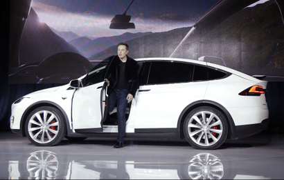 In this Sept. 29, 2015, file photo, Elon Musk, CEO of Tesla Motors Inc., introduces the Model X car at the company's headquarters in Fremont, Calif. Tesla Motors customers will get enhanced radar and other features in an over-the-air software update that starts Wednesday, Sept. 21, 2016. The update makes the Model S sedan and Model X SUV more reliant on radar than cameras when driving in Tesla's semi-autonomous Autopilot mode. Teslas made after October 2014 have radar.
