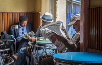 Reading the newspapers in Addis Ababa, Ethiopia.