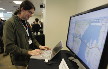 John Leen, a Google software engineer, demonstrates Google maps, at Google Inc.'s new campus in Kirkland, Wash., Wednesday, Oct. 28, 2009, during a media open house. More than 350 of Google's approximately 20,000 employees currently work in the Kirkland office. (AP Photo/Ted S. Warren)