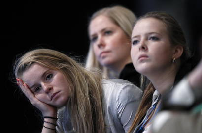 Young conference goers listen to the schools presentation on the third day of the Conservative Party Conference in Manchester, northern England October 4, 2011