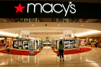 A woman shops at the Macy's store at a mall in a Denver suburb May 16, 2008.