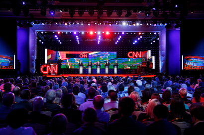 Democratic presidential candidates from left, former Virginia Sen. Jim Webb, Sen. Bernie Sanders, of Vermont, Hillary Rodham Clinton, former Maryland Gov. Martin O'Malley, and former Rhode Island Gov. Lincoln Chafee stand on stage during the CNN Democratic presidential debate Tuesday, Oct. 13, 2015, in Las Vegas. (AP Photo/John Locher)