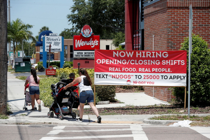 A Wendy’s restaurant displays a "Now Hiring" sign in Tampa, Florida, U.S., June 1, 2021.