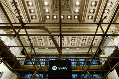 The Spotify logo is displayed as the stock waits to begin selling as a direct listing on the floor of the New York Stock Exchange in New York, U.S., April 3, 2018.