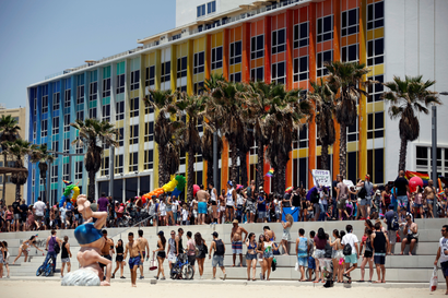 Revellers take part in a gay pride parade in Tel Aviv