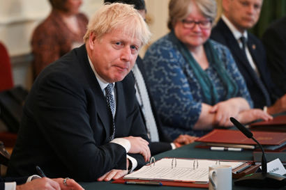 British Prime Minister Boris Johnson addresses his cabinet ahead of the weekly cabinet meeting in Downing Street in London.