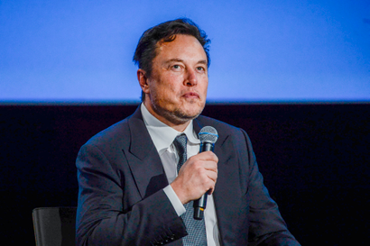 Tesla CEO Elon Musk looks up as he addresses guests at the Offshore Northern Seas 2022 (ONS) meeting in Stavanger, Norway on August 29, 2022. - The meeting, held in Stavanger from August 29 to September 1, 2022, presents the latest developments in Norway and internationally related to the energy, oil and gas sector. 