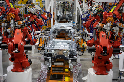 A 2021 Jeep Grand Cherokee L goes through the Framer 1 section of the assembly line at the Stellantis Detroit Assembly Complex-Mack on June 10, 2021 in Detroit, Michigan.