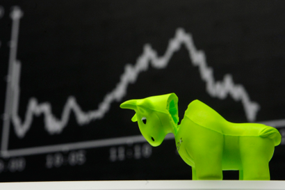 A bull styrofoam figure is pictured in front of the DAX board at the Frankfurt stock exchange.