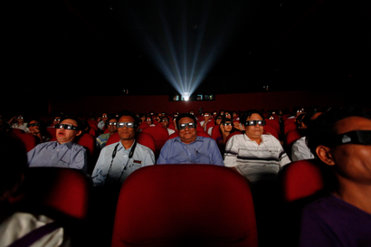 People watch a 3D movie