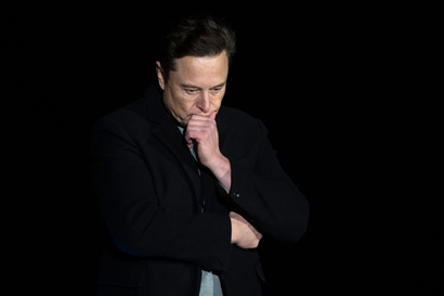 A pensive Elon Musk considers his next move