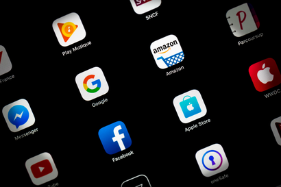 A grid of mobile app icons on a black background