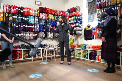 US Vice President Kamala Harris visits Fibre Space, an arts and crafts store, while discussing economic recovery .