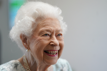 Queen Elizabeth II smiles during a visit to officially open the new building at Thames Hospice on July 15, 2022 in Maidenhead, England. 