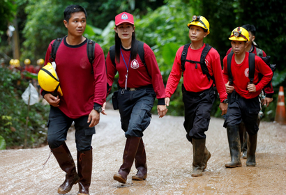 Rescue workers arrive at the Tham Luang cave complex,