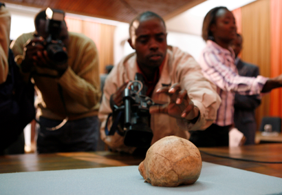 A skull of Homo erectus, dated to about 1.55 million years ago, is presented to the media during a news conference held at the National Museums of Kenya in Nairobi, April 9, 2007.