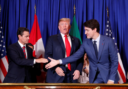U.S. President Donald Trump, Canada's Prime Minister Justin Trudeau and Mexico's President Enrique Pena Nieto attend the USMCA signing ceremony before the G20 leaders summit in Buenos Aires, Argentina November 30, 2018. REUTERS/Kevin Lamarque - RC16F417B0A0