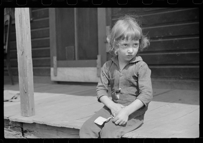 Child of coal miner in Scotts Run, West Virginia, 1938. Part of a project to document American poverty for the US Works Project Administration.