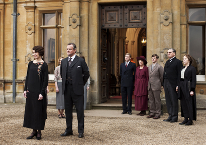 This undated publicity photo provided by PBS shows, from left, Elizabeth McGovern as Lady Grantham, Hugh Bonneville as Lord Grantham, Dan Stevens as Matthew Crawley, Penelope Wilton as Isobel Crawley, Allen Leech as Tom Branson, Jim Carter as Mr. Carson, and Phyllis Logan as Mrs. Hughes, from the TV series, "Downton Abbey." The show was nominated for a Golden Globe for best drama series on Thursday, Dec. 12, 2013. The 71st annual Golden Globes will air on Sunday, Jan. 12.