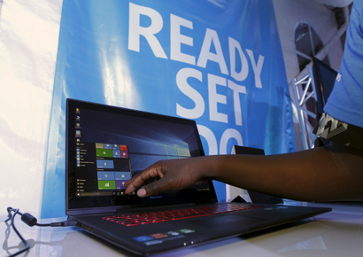 A Microsoft delegate checks applications on a computer during the launch of the Windows 10 operating system in Kenya's capital Nairobi, July 29, 2015.