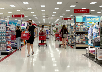 Customers walk down a Target store aisle on June 08, 2022 in San Rafael, California. 