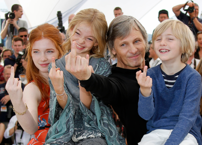 Cast members Viggo Mortensen, Charlie Shotwell, Shree Crooks and Annalise Basso gesture during a photocall for the film "Captain Fantastic" in competition in "Un Certain Regard" at the 69th Cannes Film Festival in Cannes