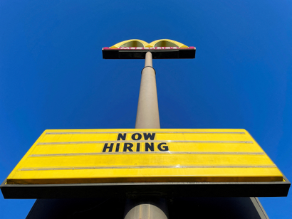A sign outside a McDonalds restaurant reads "Now Hiring" in Augusta, Georgia, U.S., April11, 2022. 