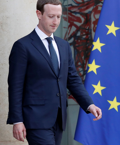 Facebook's CEO Mark Zuckerberg leaves after a meeting with French President at the Elysee Palace in Paris