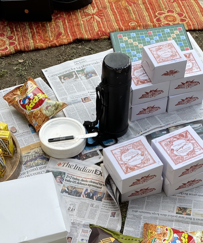 A picnic at Sunder Nursery with "nostalgia" boxes from Wenger's bakery.
