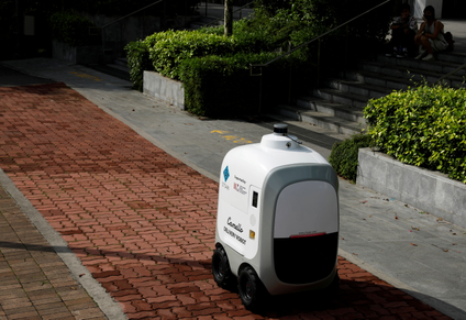A delivery robot makes a trip in Singapore.